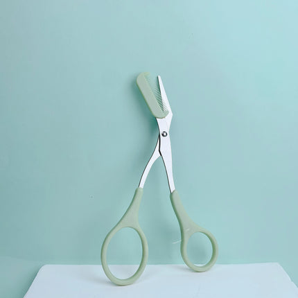 Pink eyebrow trimming scissors with built-in comb - stainless steel, precise grooming tool, creating perfect eyebrows